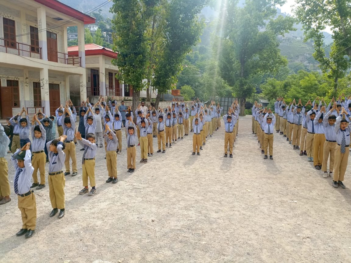 Students doing morning exercise during assembly